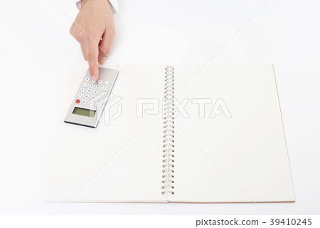 Woman calculating with a calculator Woman calculating with a calculator 39410245