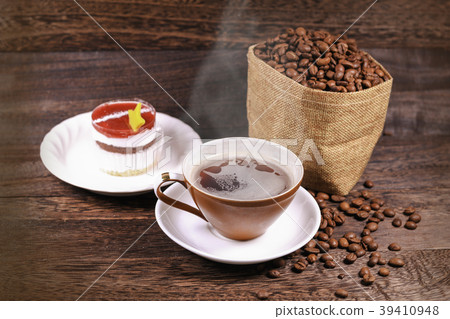Cup of black coffee and coffee beans in a bag Cup of black coffee and coffee beans in a bag 39410948