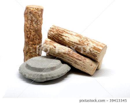 Thanaka wood and Kyauk pyin stone slab on white Thanaka wood and Kyauk pyin stone slab on white 39413345