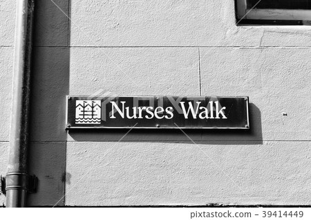 in the wall the sign of nursers walk  street 39414449