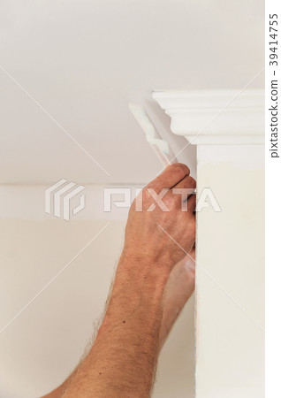 Installation of ceiling moldings. Installation of ceiling moldings. 39414755