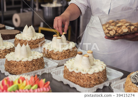 Manual cakes production 39415274