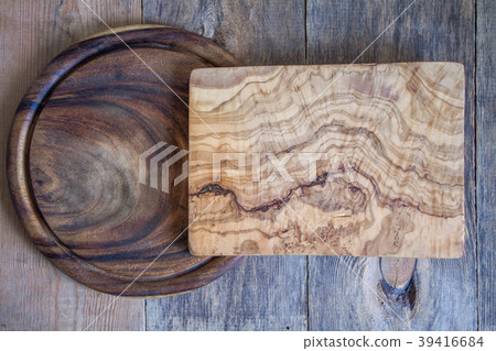 Chopping boards of different shapes on a wooden Chopping boards of different shapes on a wooden 39416684