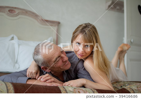 Indoors Portrait of Joyful Couple with Age 39416686