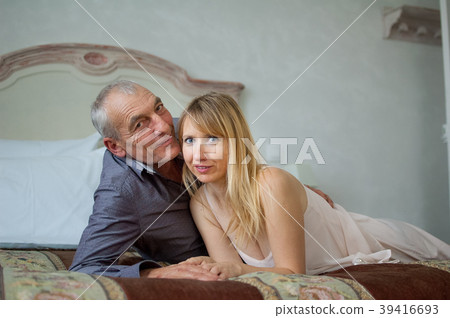 Portrait of Smiling Couple with Age Difference 39416693