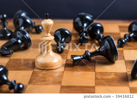 White king surrounded by black chess pieces White king surrounded by black chess pieces 39416812