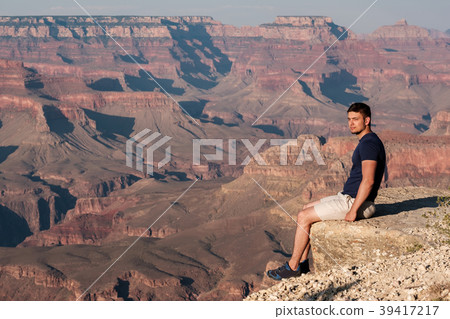 Tourist at Grand Canyon Tourist at Grand Canyon 39417217