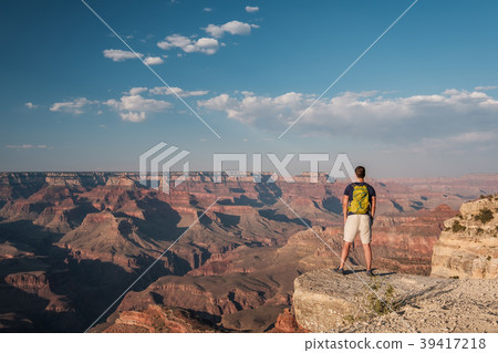 Tourist with backpack at Grand Canyon 39417218