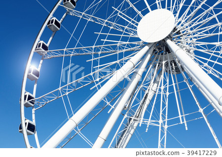 Ferris wheel over a blue sky Ferris wheel over a blue sky 39417229