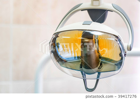 White dental light in dentist office close 39417276