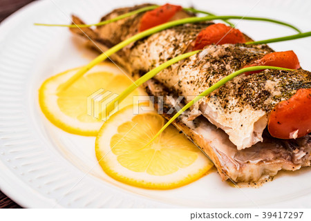 Roasted zander fillet with asparagus and lemon 39417297