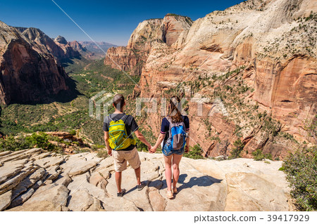 Tourists with backpack hiking in Zion 39417929