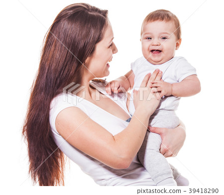 Pretty mother tickling baby 39418290