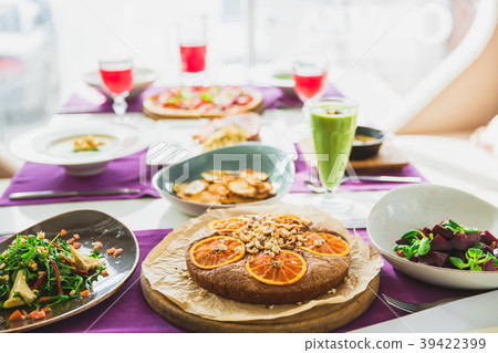 Table in restaurant with vegetarian dishes 39422399