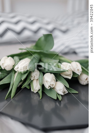 White tulips on a tray White tulips on a tray 39422845