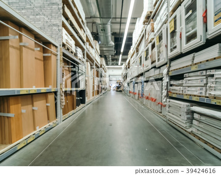Blurred aisle with finishing materials in hardware Blurred aisle with finishing materials in hardware 39424616