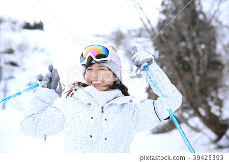 Woman enjoying ski Woman enjoying ski 39425393