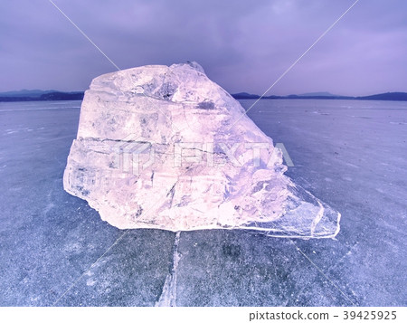 Natural ice block. Ice floe break due to wind Natural ice block. Ice floe break due to wind 39425925