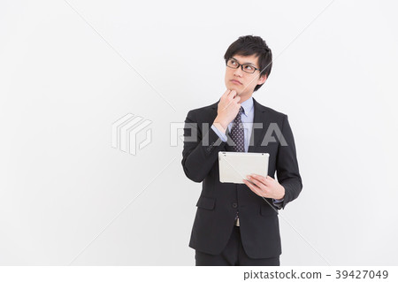 Men with tablet think business 39427049