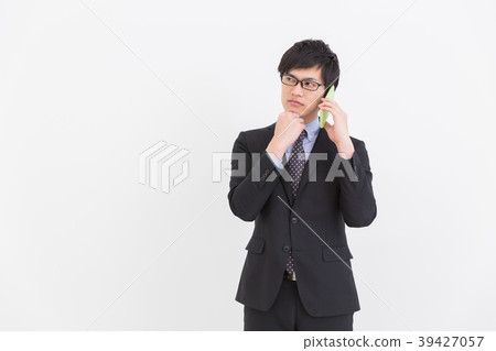Business man thinking Business man thinking 39427057