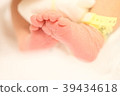 Baby's foot 39434618