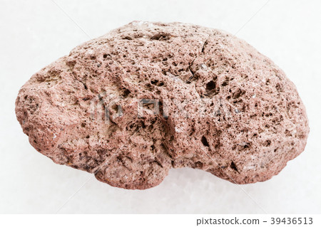 red pumice stone on white marble 39436513