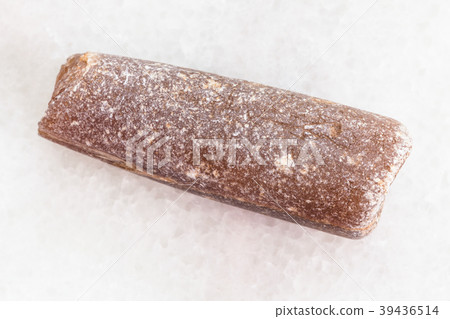 thunderstone fossil on white marble 39436514