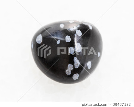 tumbled snowflake obsidian gemstone on white 39437182