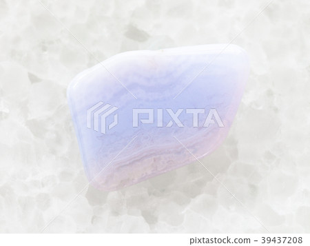 polished blue lace agate gemstone on white marble polished blue lace agate gemstone on white marble 39437208