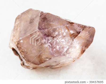 rough crystal of amethyst gemstone on white rough crystal of amethyst gemstone on white 39437695