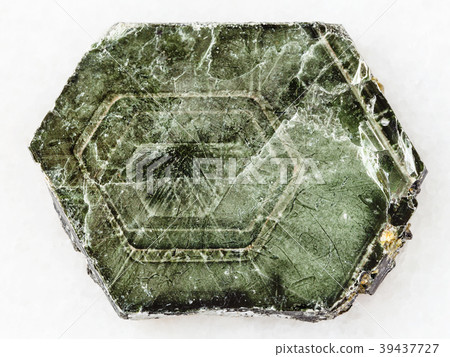 raw Phlogopite stone on white marble raw Phlogopite stone on white marble 39437727