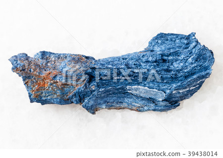 rough Rhodusite stone on white marble 39438014