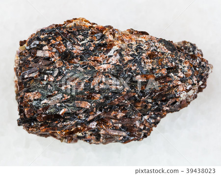 rough Titanite stone on white marble 39438023