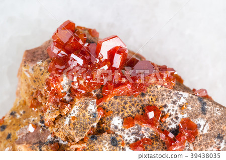 raw crystals of Vanadinite stone close up on white 39438035
