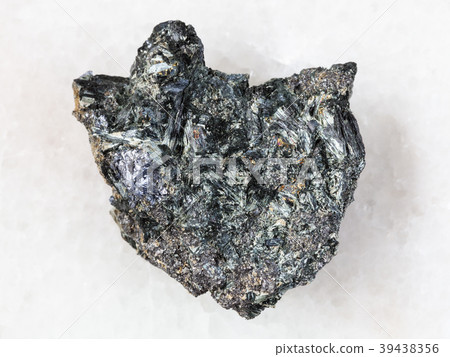 Molybdenite crystal in raw Glaucophane on white 39438356