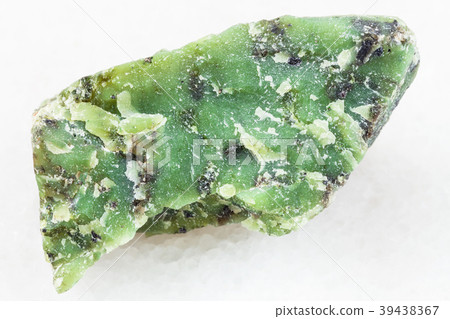 rough Lizardite stone on white rough Lizardite stone on white 39438367
