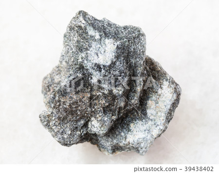 raw Soapstone stone ( talc - schist ) on white raw Soapstone stone ( talc - schist ) on white 39438402