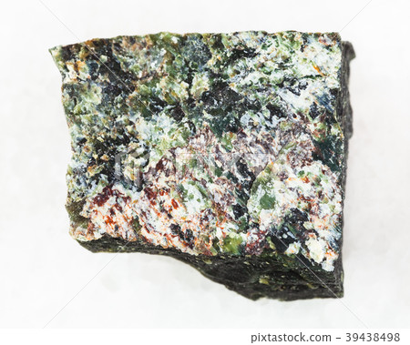 rough dunite stone on white 39438498