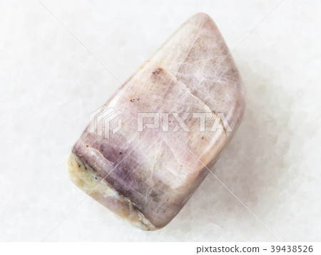 polished Cancrinite gemstone on white 39438526