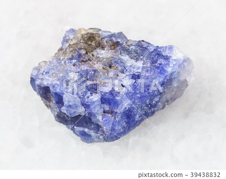 rough crystal of Tanzanite gemstone on white 39438832