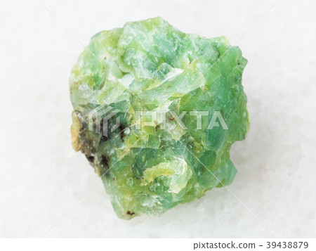 raw crystal of chrysopal gemstone on white raw crystal of chrysopal gemstone on white 39438879
