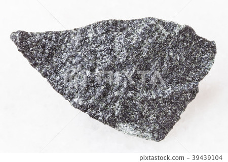 raw dolerite (diabase) stone on white raw dolerite (diabase) stone on white 39439104