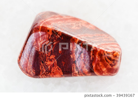 polished Brecciated red jasper gemstone on white 39439167