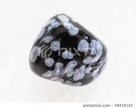 tumbled snowflake obsidian gemstone on white 39439183