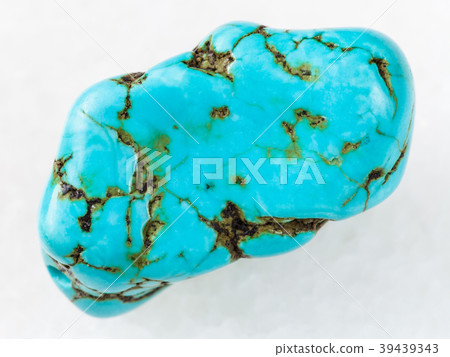 tumbled blue howlite (turquenite) stone on white tumbled blue howlite (turquenite) stone on white 39439343
