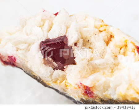 Cinnabar crystal close up in rough Carbonatite 39439415