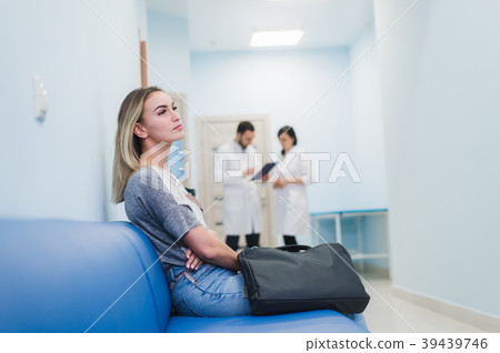 Woman patient waiting at hospital Doctors Waiting 39439746