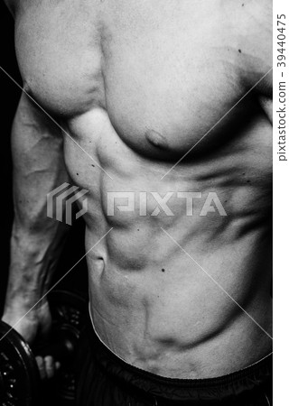 Muscular sexy torso of young sporty man with Muscular sexy torso of young sporty man with 39440475
