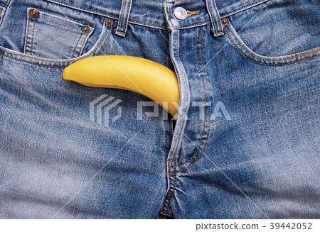 Banana out of jeans like mens penis. 39442052