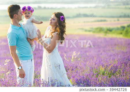 Young family in a lavender field Young family in a lavender field 39442726